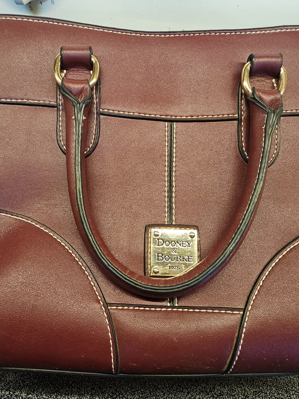Dooney & Burke Handbag in Burgundy